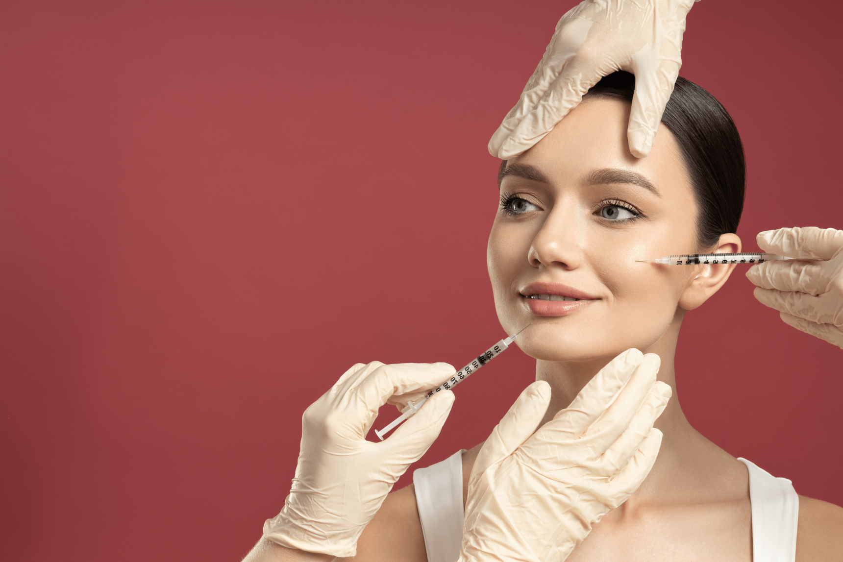 A woman getting dermal filler treatments.